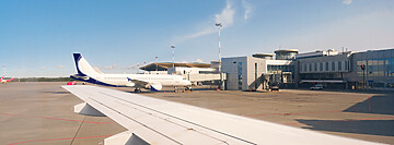 busy airport view with airplanes against clear sky - Aviation AI Development Services 2 busy airport view with airplanes against clear sky - Aviation AI Development Services