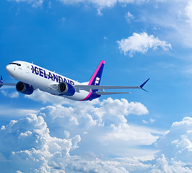 icelandair plane flying in clouds - Automating and Optimizing Icelandair's Per Diem Crew Payroll 3 icelandair plane flying in clouds - Automating and Optimizing Icelandair's Per Diem Crew Payroll